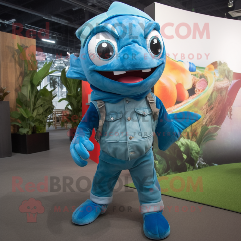 Cyan Piranha mascot costume character dressed with a Bootcut Jeans and Gloves