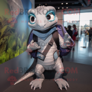 Silver Geckos mascot costume character dressed with a Sweater and Backpacks