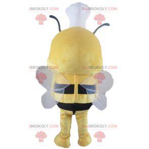 Gul og svart bie-maskot med toque på hodet - Redbrokoly.com