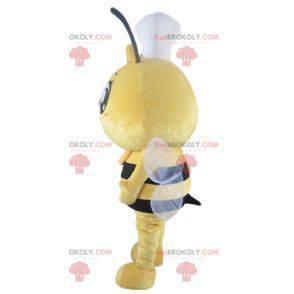 Mascota de abeja amarilla y negra con un toque en la cabeza. -
