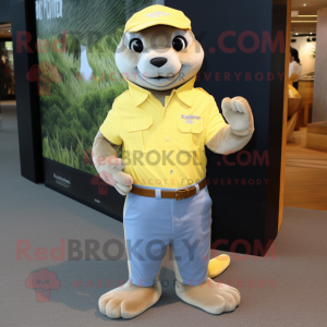 Lemon Yellow Otter mascot costume character dressed with a Denim Shirt and Foot pads