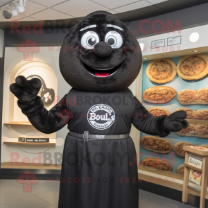 Black Bagels mascot costume character dressed with a Henley Tee and Rings