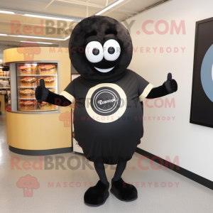 Black Bagels mascot costume character dressed with a Henley Tee and Rings