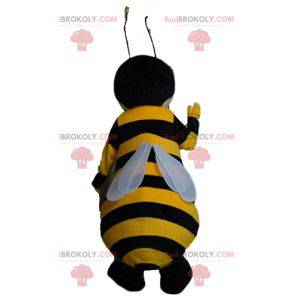 Mascote abelha amarela e preta sorridente - Redbrokoly.com