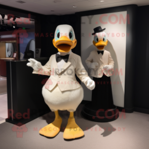 Beige Duck mascot costume character dressed with a Tuxedo and Watches