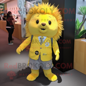 Lemon Yellow Porcupine mascot costume character dressed with a Shorts and Lapel pins