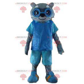Graues Katzenmaskottchen im blauen Outfit mit Brille -
