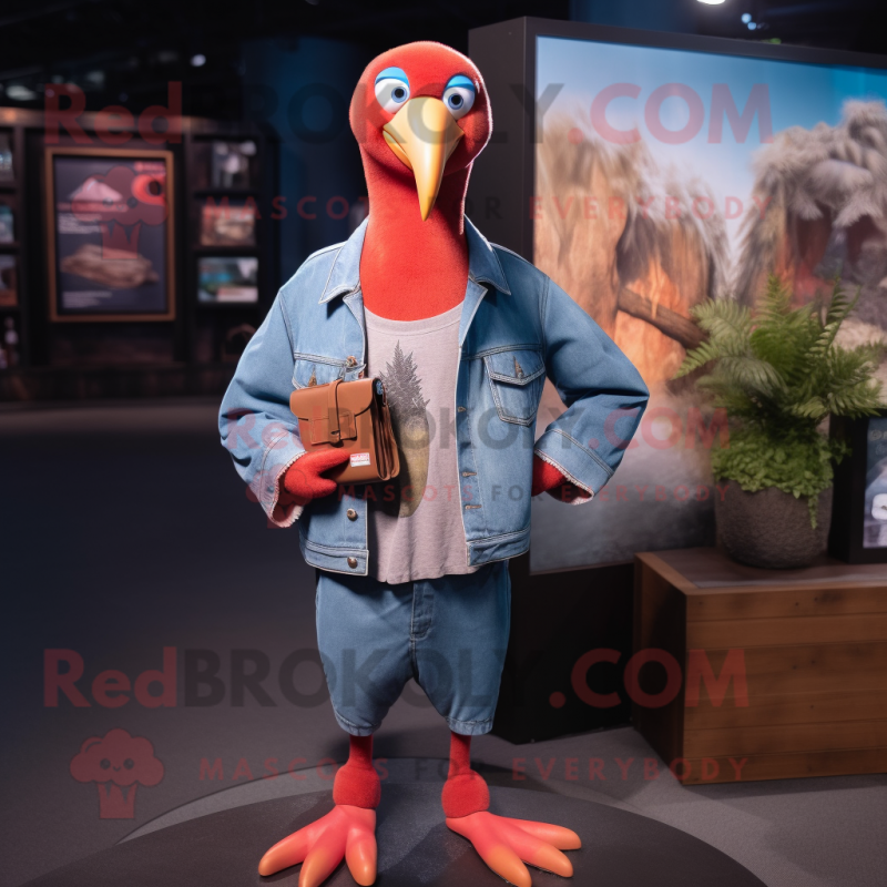 Red Albatross mascot costume character dressed with a Denim Shirt and Wallets