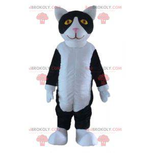 Zwart-witte kat mascotte met gele ogen - Redbrokoly.com