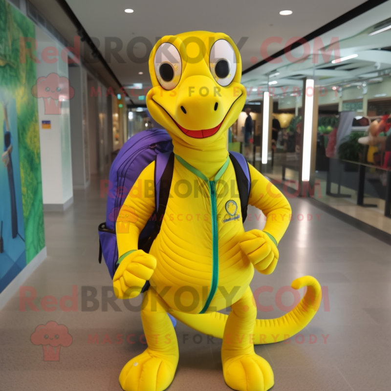 Lemon Yellow Snake mascot costume character dressed with a Polo Shirt and Backpacks