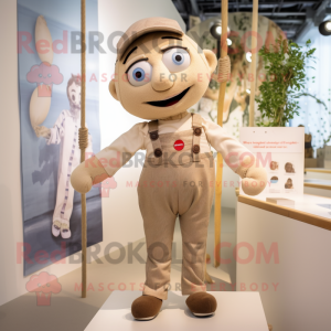 Beige Tightrope Walker mascot costume character dressed with a Dungarees and Lapel pins