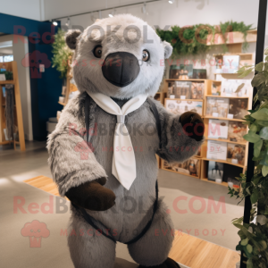 Gray Giant Sloth mascot costume character dressed with a Culottes and Bow ties