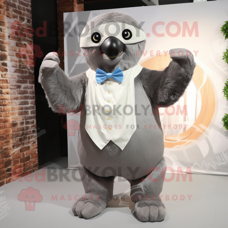 Gray Giant Sloth mascot costume character dressed with a Culottes and Bow ties