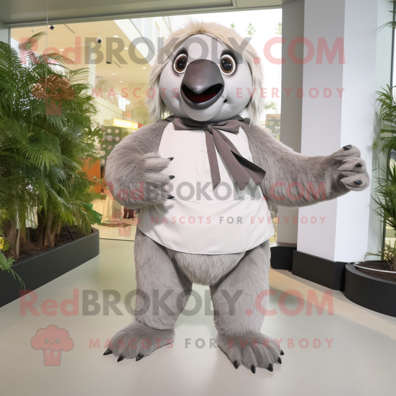 Gray Giant Sloth mascot costume character dressed with a Culottes and Bow ties