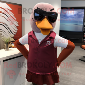 Maroon Seagull mascot costume character dressed with a Tank Top and Tie pins