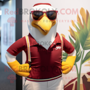 Maroon Seagull mascot costume character dressed with a Tank Top and Tie pins