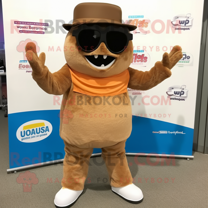 Brown Enchiladas mascot costume character dressed with a Chinos and Sunglasses