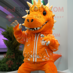 Orange Stegosaurus mascot costume character dressed with a Hoodie and Lapel pins