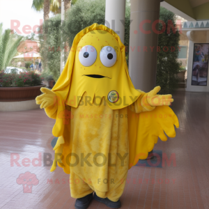 Yellow Paella mascot costume character dressed with a Cover-up and Rings