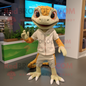 Tan Geckos mascot costume character dressed with a Sweatshirt and Shoe laces