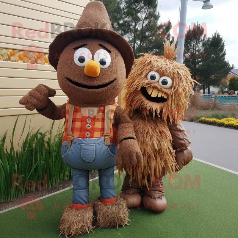 Brown Scarecrow mascot costume character dressed with a Sweater and Keychains Brown Scarecrow mascot costume character dressed with a Sweater and Keychains