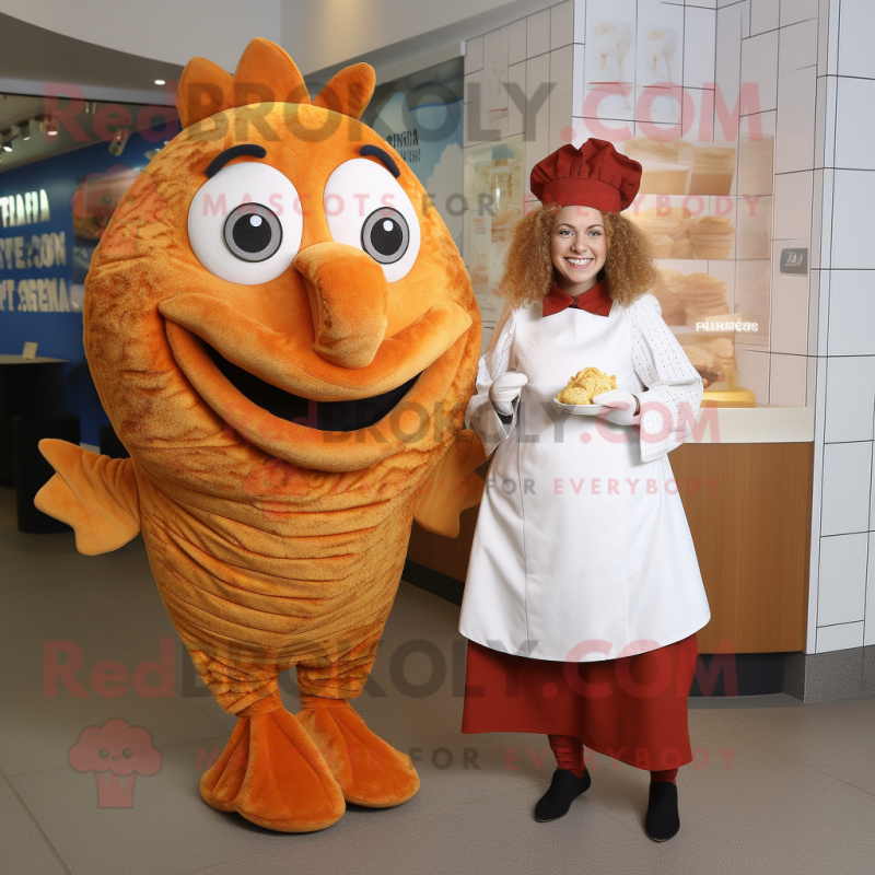 Rust Fish And Chips mascot costume character dressed with a Blouse and Brooches