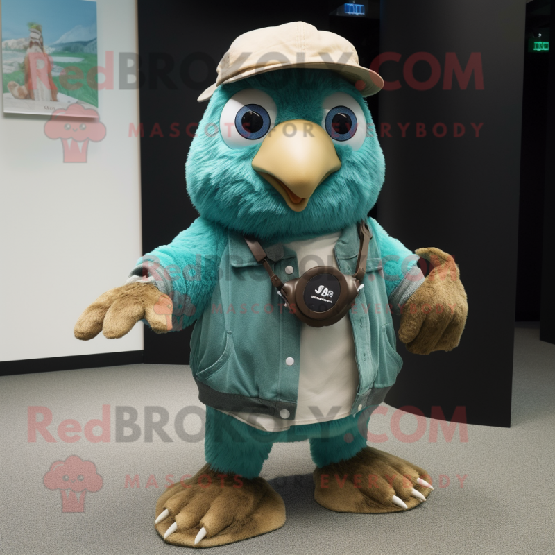 Teal Kiwi mascot costume character dressed with a Chinos and Keychains