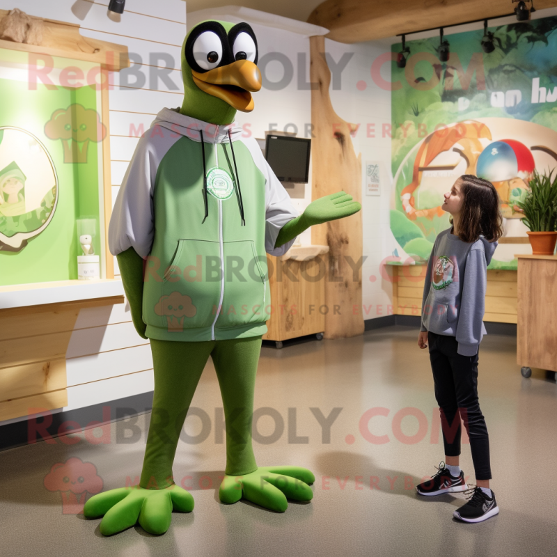 Olive Stilt Walker mascot costume character dressed with a Sweatshirt and Watches Olive Stilt Walker mascot costume character dressed with a Sweatshirt and Watches