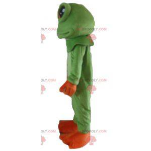 Mascotte de grenouille verte et orange très réaliste -