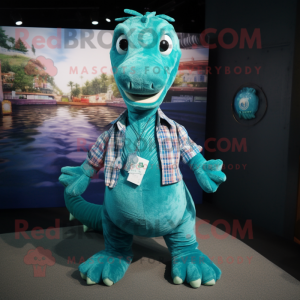 Turquoise Loch Ness Monster mascot costume character dressed with a Button-Up Shirt and Keychains