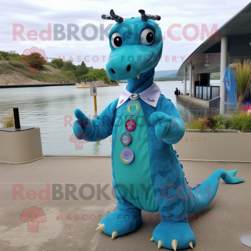 Turquoise Loch Ness Monster mascot costume character dressed with a Button-Up Shirt and Keychains