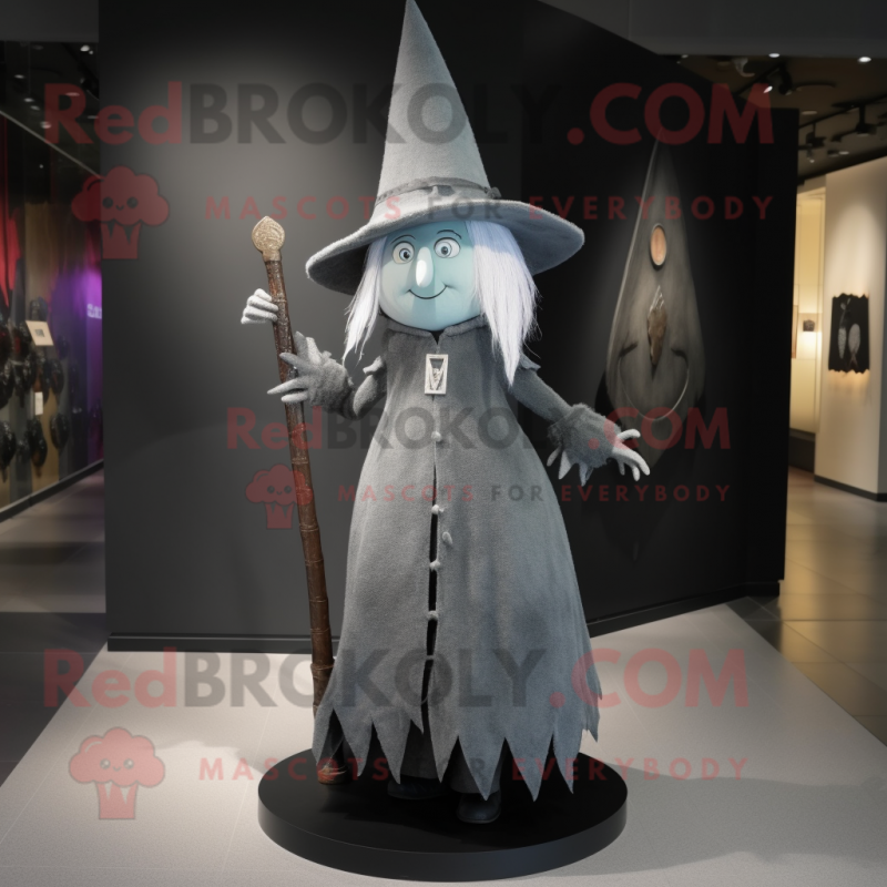 Gray Witch'S Hat mascot costume character dressed with a Sheath Dress and Hairpins
