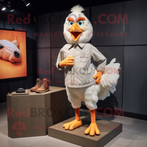 Peach Chicken mascot costume character dressed with a Chinos and Shoe clips