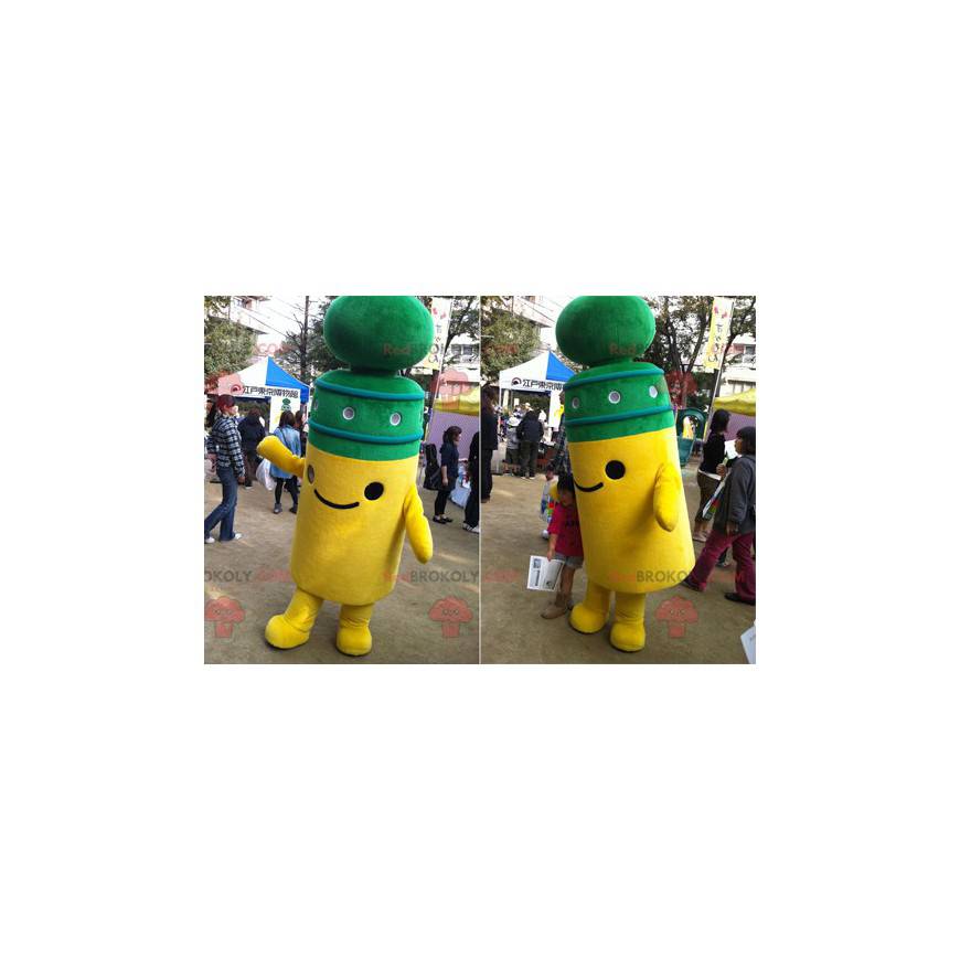 Mascotte jaune et vert de poteau mignon et souriant -