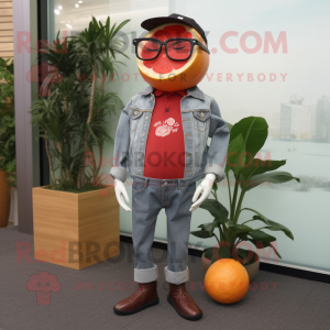 Red Grapefruit mascot costume character dressed with a Jeans and Eyeglasses