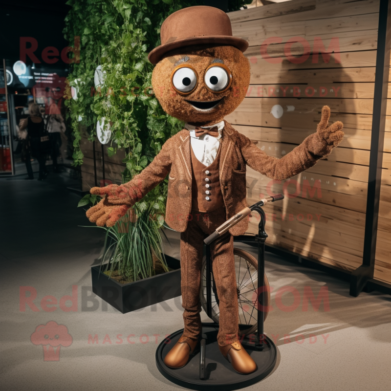 Brown Unicyclist mascot costume character dressed with a Suit and Necklaces Brown Unicyclist mascot costume character dressed with a Suit and Necklaces