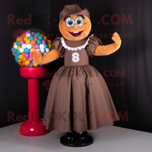 Brown Gumball Machine mascot costume character dressed with a Skirt and Gloves