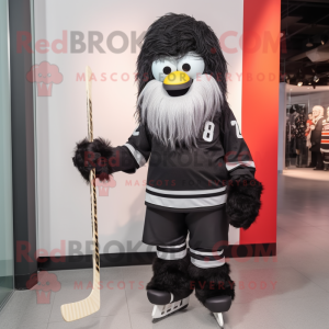 Black Ice Hockey Stick mascot costume character dressed with a Bermuda Shorts and Shawl pins