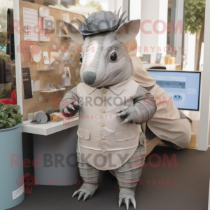 Silver Armadillo mascot costume character dressed with a Oxford Shirt and Keychains