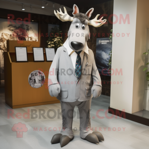 Silver Moose mascot costume character dressed with a Sheath Dress and Tie pins