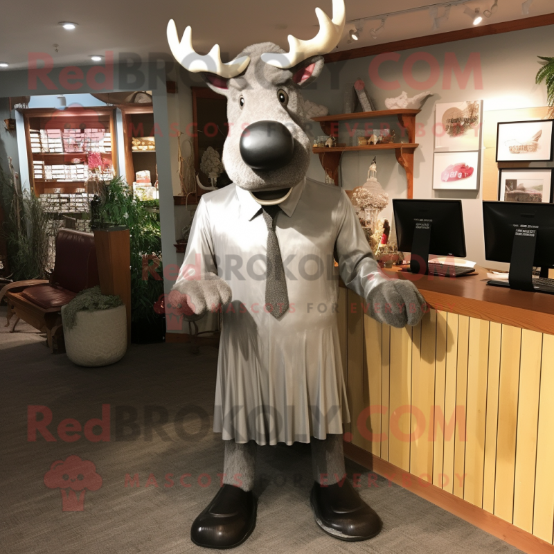Silver Moose mascot costume character dressed with a Sheath Dress and Tie pins Silver Moose mascot costume character dressed with a Sheath Dress and Tie pins