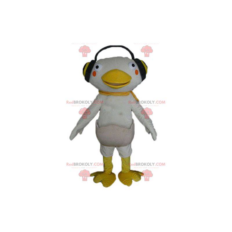 Witte en gele eend mascotte met koptelefoon op de oren -