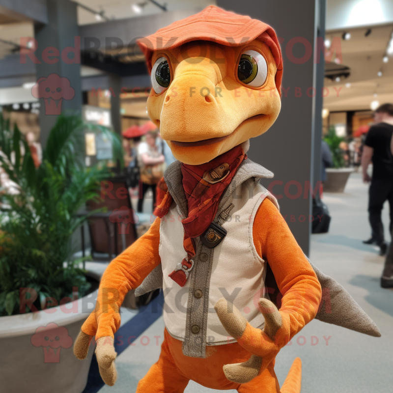 Orange Utahraptor mascot costume character dressed with a Overalls and Shawls Orange Utahraptor mascot costume character dressed with a Overalls and Shawls