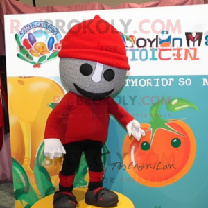 Red Tomato mascot costume character dressed with a Board Shorts and Beanies