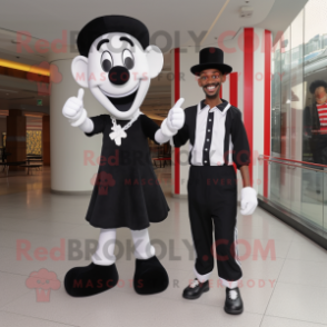 Black Mime mascot costume character dressed with a Flare Jeans and Shoe laces
