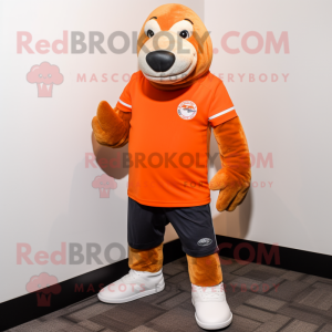 Orange Sea Lion mascot costume character dressed with a Polo Tee and Shoe laces