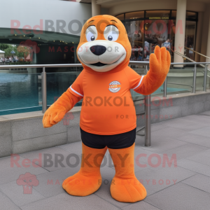 Orange Sea Lion mascot costume character dressed with a Polo Tee and Shoe laces