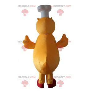 Mascote pato amarelo e pintinho vermelho com chapéu de chef -