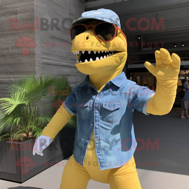 Yellow T Rex mascot costume character dressed with a Chambray Shirt and Sunglasses Yellow T Rex mascot costume character dressed with a Chambray Shirt and Sunglasses