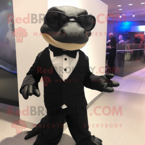 nan Komodo Dragon mascot costume character dressed with a Tuxedo and Eyeglasses